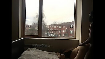 A Horny Wife Gets Fucked By A Black Guy By The Window For Public Viewing Pleasure