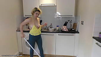 Delilah Cleans The Kitchen And Flaunts Her Curves In A Seductive Downblouse